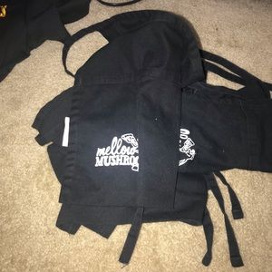 Mellow mushroom aprons (3)